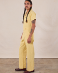 Short Sleeve Jumpsuit in Butter Yellow side view on Anthony