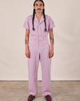 Anthony is 5'10" and wearing S Short Sleeve Jumpsuit in Lilac