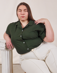 Marielena is wearing Pantry Button-Up in Swamp Green