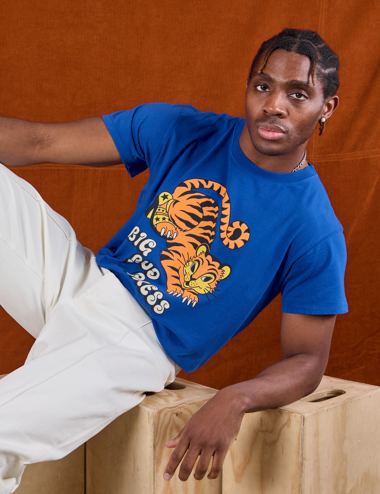 Isaac is wearing BBP Tiger Tee