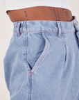 Indigo Wide Leg Trousers in Light Wash side view close up on Jerrod
