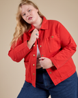 Juliet is wearing Denim Work Jacket in Mustang Red