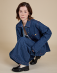 Hana is wearing Indigo Denim Work Jacket in Dark Wash