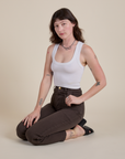 Work Pants in Espresso Brown and Cropped Tank in Vintage Tee White worn by Alex