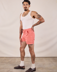 Side view of Classic Work Shorts in Flamingo Pink and Tank Top in Vintage Tee Off-White on Jesse