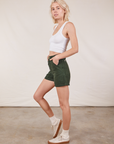 Side view of Classic Work Shorts in Swamp Green and Cropped Tank Top in vintage tee off-white on Madeline