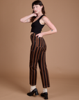 Angled back view of Black Stripe Work Pants in Fudgesicle Brown on Alex