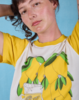 Anniversary Tee in Lemon front close up on Alex