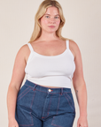 Lish is 5’8” and wearing M Cropped Cami in Vintage Tee Off-White paired with dark wash Carpenter Jeans