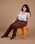 Carpenter Jeans in Fudgesicle Brown and Cropped Tank in Vintage Tee White on Ashley