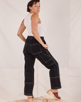 Back view of Carpenter Jeans in Black worn by Tiara