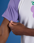 Produce Raglan Tee in Grape sleeve close up on Isaac