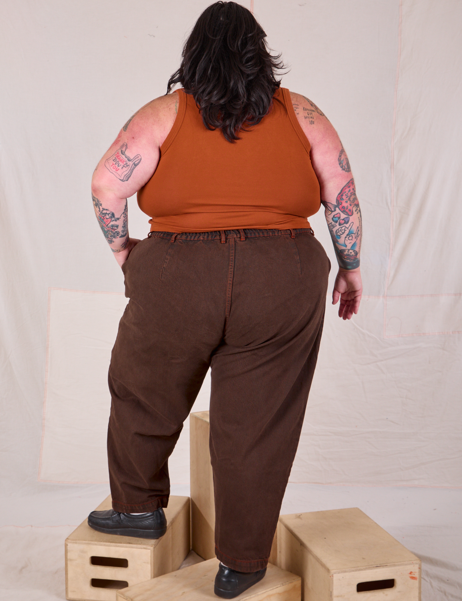 Back view of Overdyed Denim Trouser in Fudge and burnt terracotta Cropped Tank