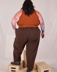 Back view of Overdyed Denim Trouser in Fudge and burnt terracotta Cropped Tank