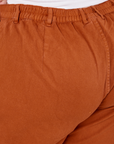 Back view close up of Heavyweight Trousers in Burnt Terracotta on Ashley