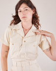 Heritage Short Sleeve Jumpsuit in Natural close up on Alex