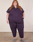 Catie is 5'11" and wearing 5XL Short Sleeve Jumpsuit in Nebula Purple