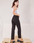 Organic Work Pants in Basic Black angled back view on Alex
