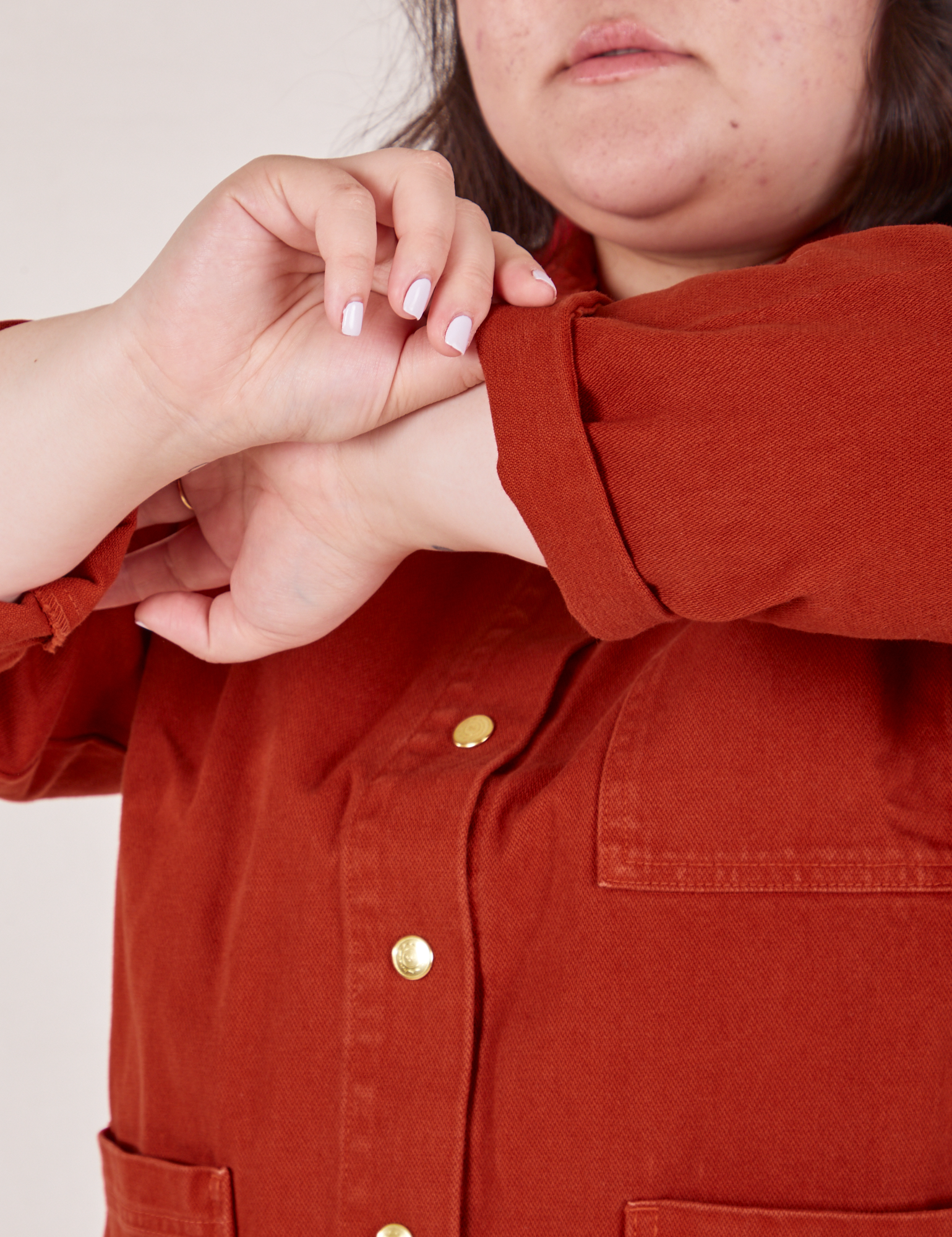 Close up Denim Work Jacket in Paprika sleeves worn by Ashley.
