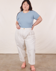 Ashley is wearing Baby Tee in Periwinkle and vintage off-white Trousers