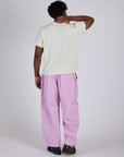 Back view of Drop Pocket Cargo Pants in Lilac Purple and Organic Vintage Tee in Vintage Tee White on Isaac