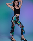 Side view of Work Pants in Rainbow Magic Waters and black Cropped Tank on Alex