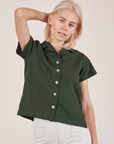 Madeline is 5'9" and wearing P Pantry Button-Up in Swamp Green