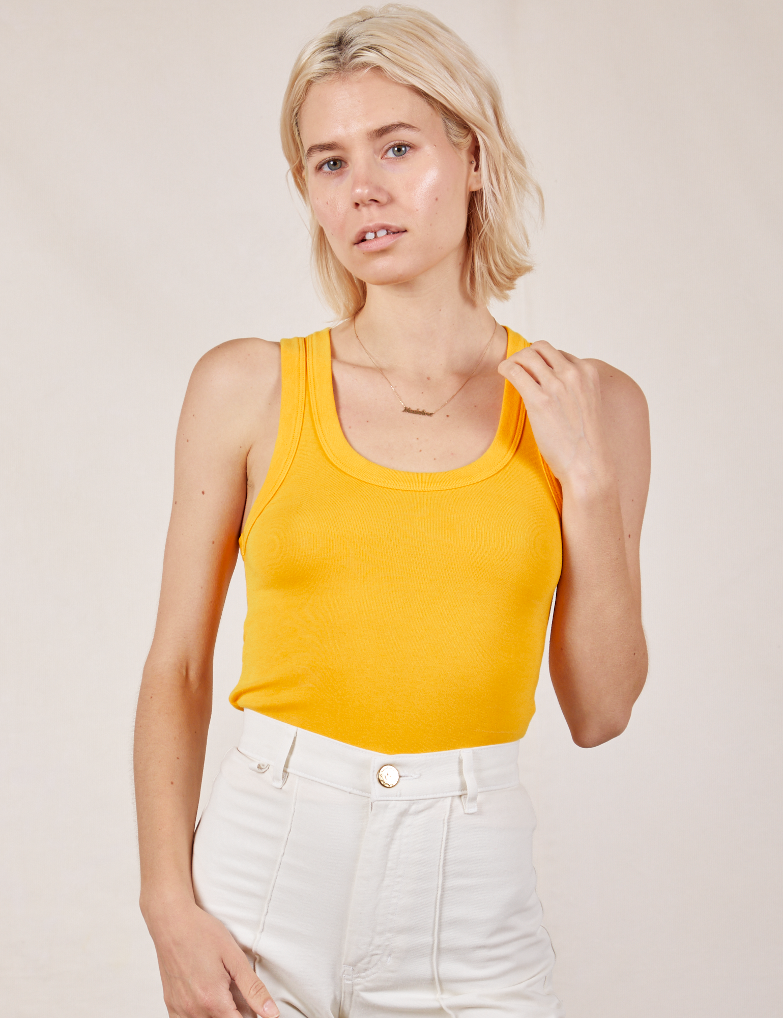 Madeline is wearing Tank Top in Sunshine Yellow