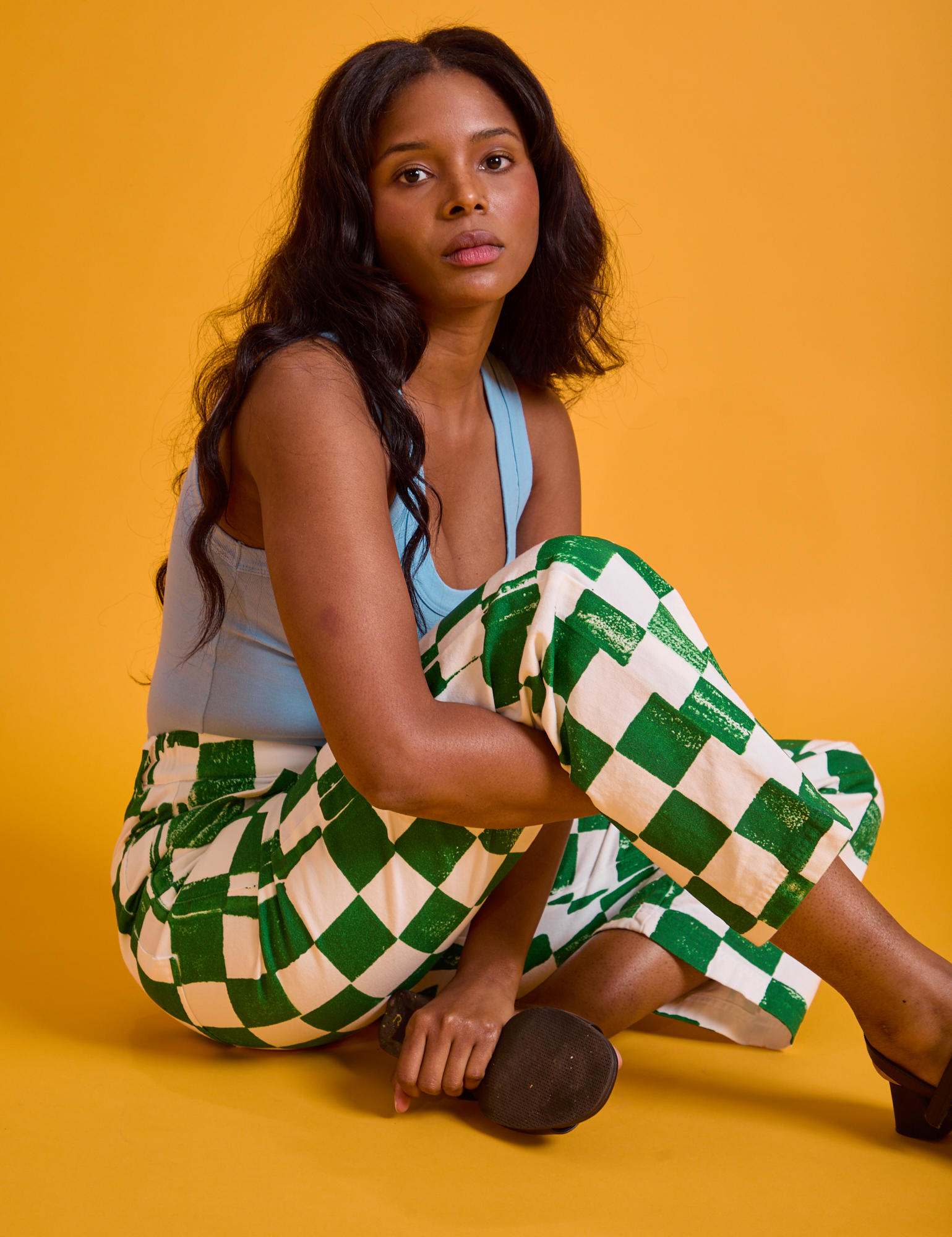 Kandia is wearing Checkerboard Work Pants in White/Green