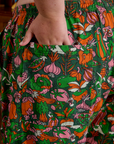 Close up of Juliet's hand in the back pocket of Drop Pocket Cargo Pants in Kitchen Collection