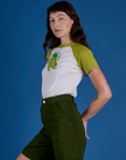 Side view of Produce Raglan Tee in Snap Peas on Alex