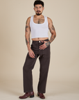 Jesse is 5’8” and wearing S Work Pants in Espresso Brown paired with a vintage tee white Cropped Tank