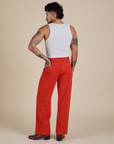 Back view of Work Pants in Mustang Red and Cropped Tank in Vintage Tee White on Jesse
