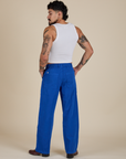 Back view of Work Pants in Royal Blue and Cropped Tank in Vintage Tee White on Jesse