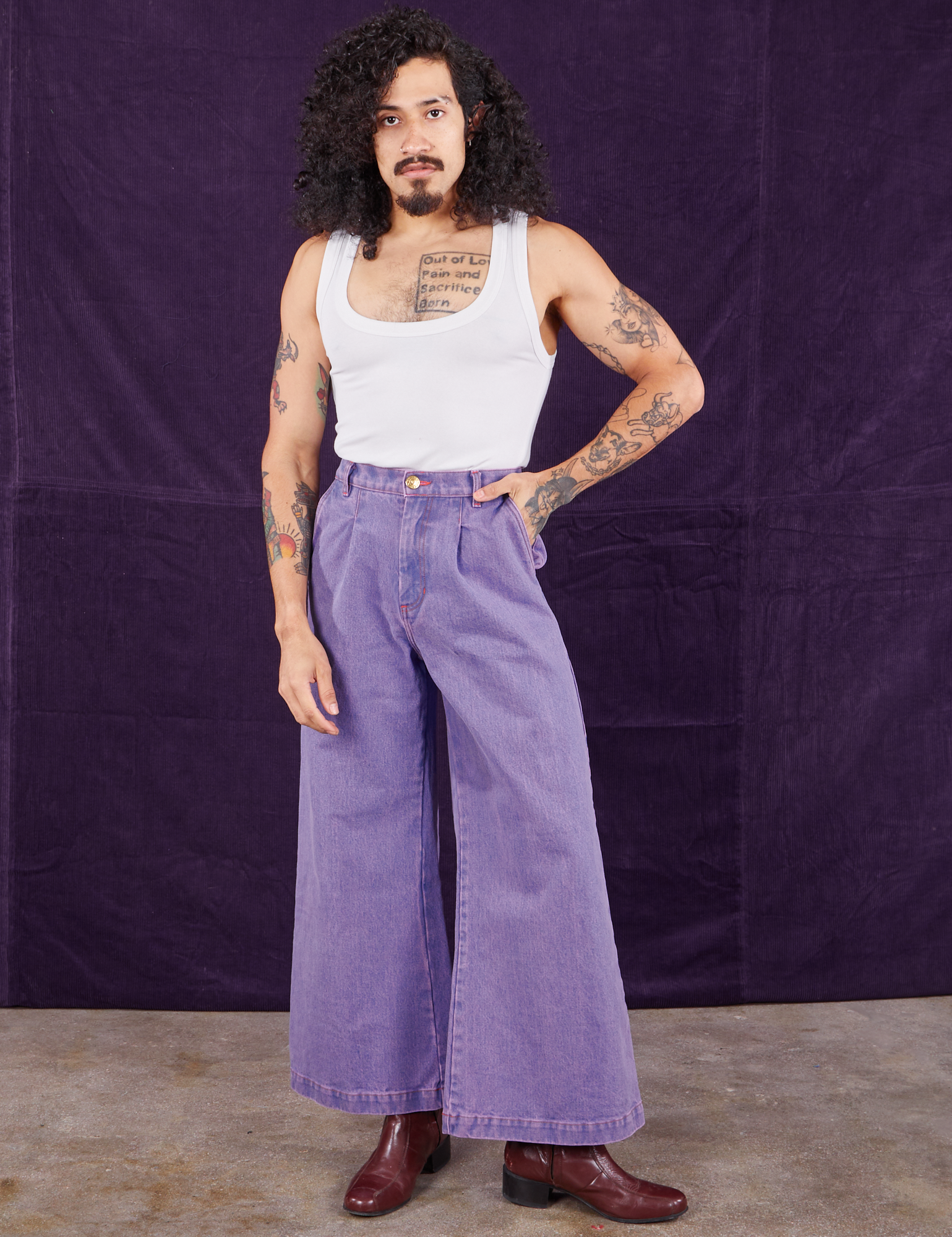 Jesse is 5&#39;8&quot; and wearing XXS Overdyed Wide Leg Trousers in Faded Grape paired with Cropped Tank Top in vintage tee off-white