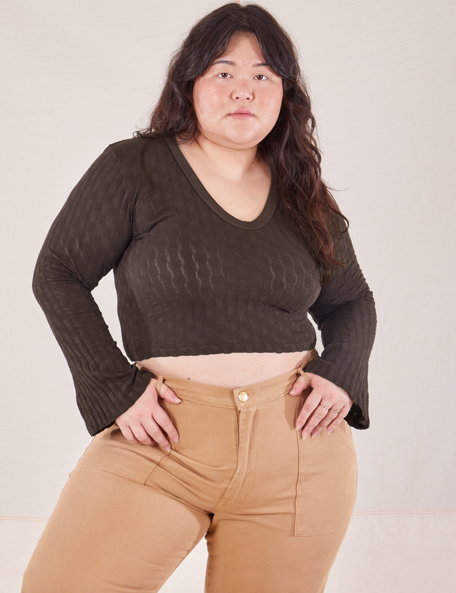 Ashley is wearing L Bell Sleeve Top in Espresso Brown