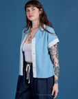 Angled front view of Painted Pantry Button-Up in Baby Blue on Sydney
