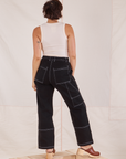 Back view of Carpenter Jeans in Black and Tank Top in vintage tee off-white worn by Tiara