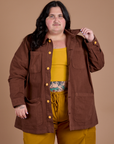 Sam is 5'10" and wearing 2XL Ripstop Field Coat in Fudgesicle Brown