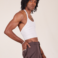Side view of Halter Top in Vintage Off-White and espresso brown Western Pants worn by Jerrod