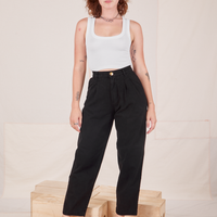 Alex is 5'8" and wearing XXS Heavyweight Trousers in Basic Black paired with vintage off-white Cropped Tank Top.