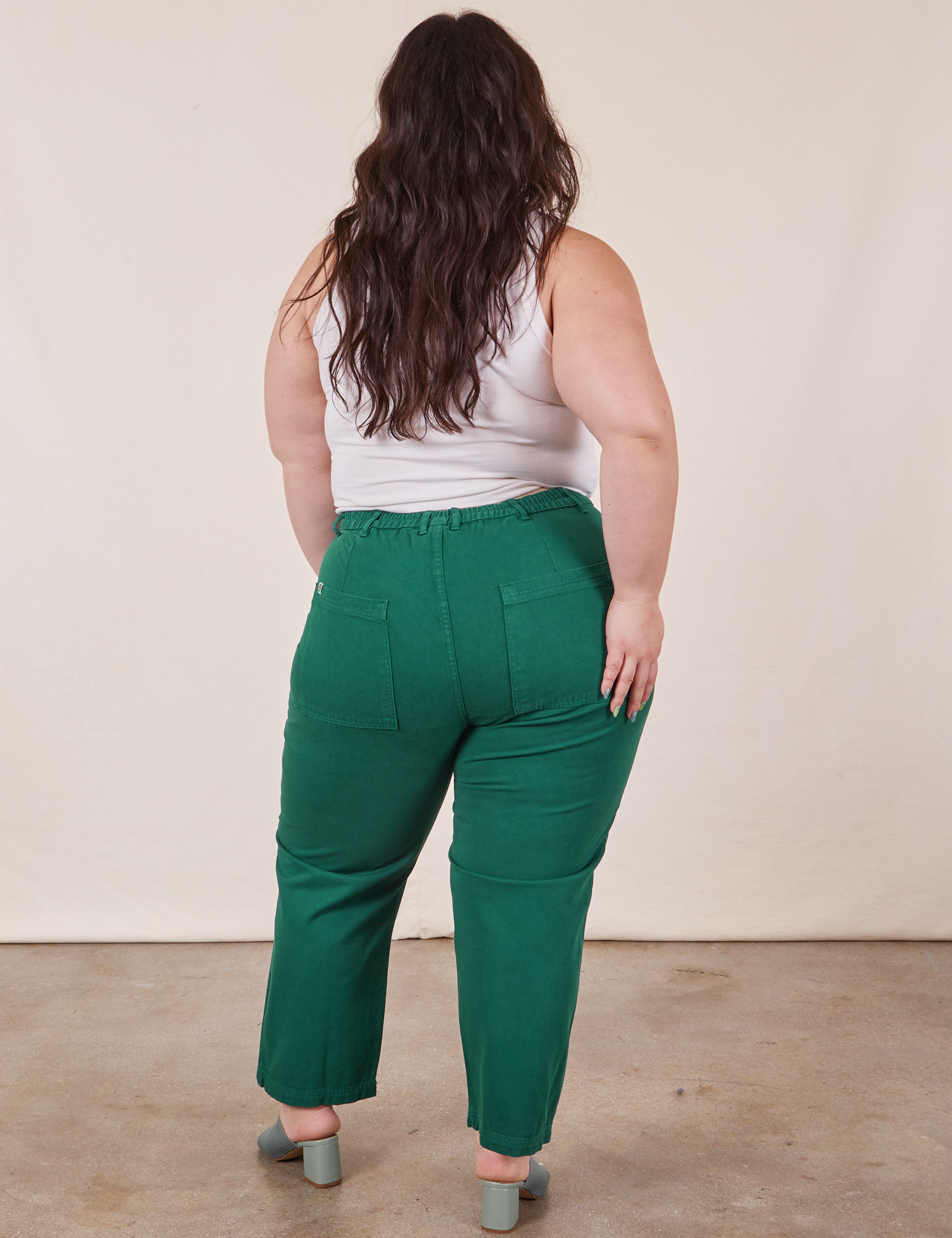 Back view of Work Pants in Hunter Green worn by Ashley