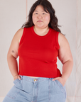 Ashley is 5’7” and wearing XL Muscle Tee in Mustang Red