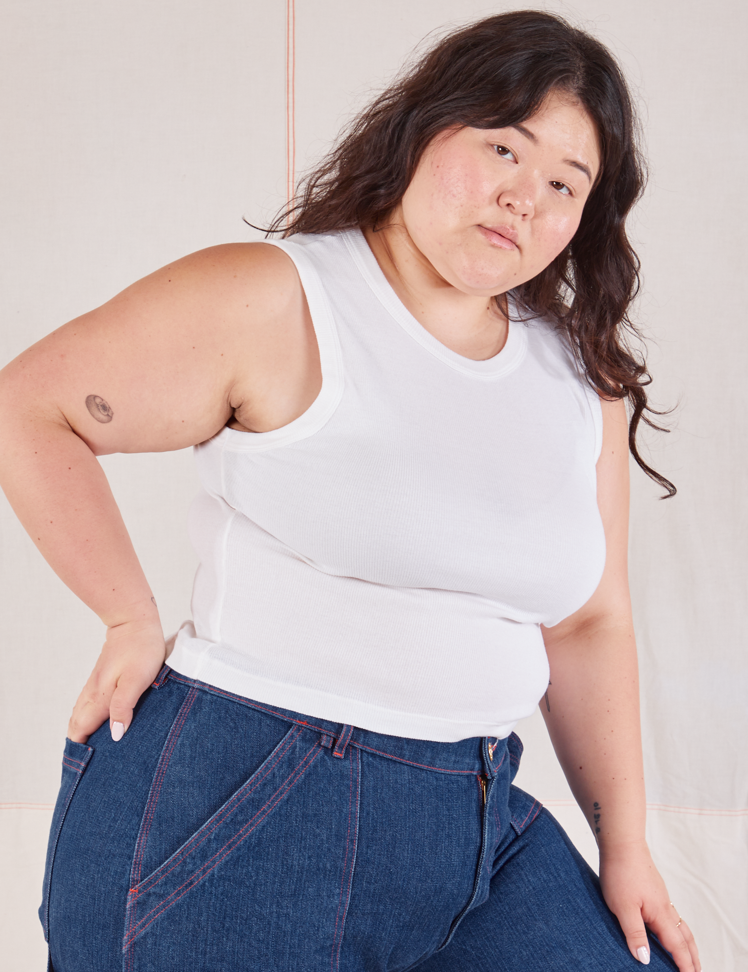 Ashley is wearing Muscle Tee in Vintage Tee Off-White