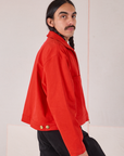 Mechanic Jacket in Mustang Red side view on Anthony