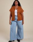 Pantry Button-Up in Burnt Terracotta and light wash Indigo Wide Leg Trousers on Meghna