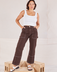 Tiara is 5'4" and wearing S Railroad Carpenter Jeans in Fudgesicle Brown paired with vintage tee off-white Square Neck Tank