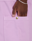 Close up of Isaac's hand in the side pant leg pocket of Drop Pocket Cargo Pants in Lilac Purple
