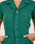 Front close up of Short Sleeve Jumpsuit in Hunter Green worn by Gabi