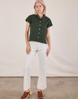 Madeline is wearing Pantry Button-Up in Swamp Green and vintage tee off-white Western Pants
